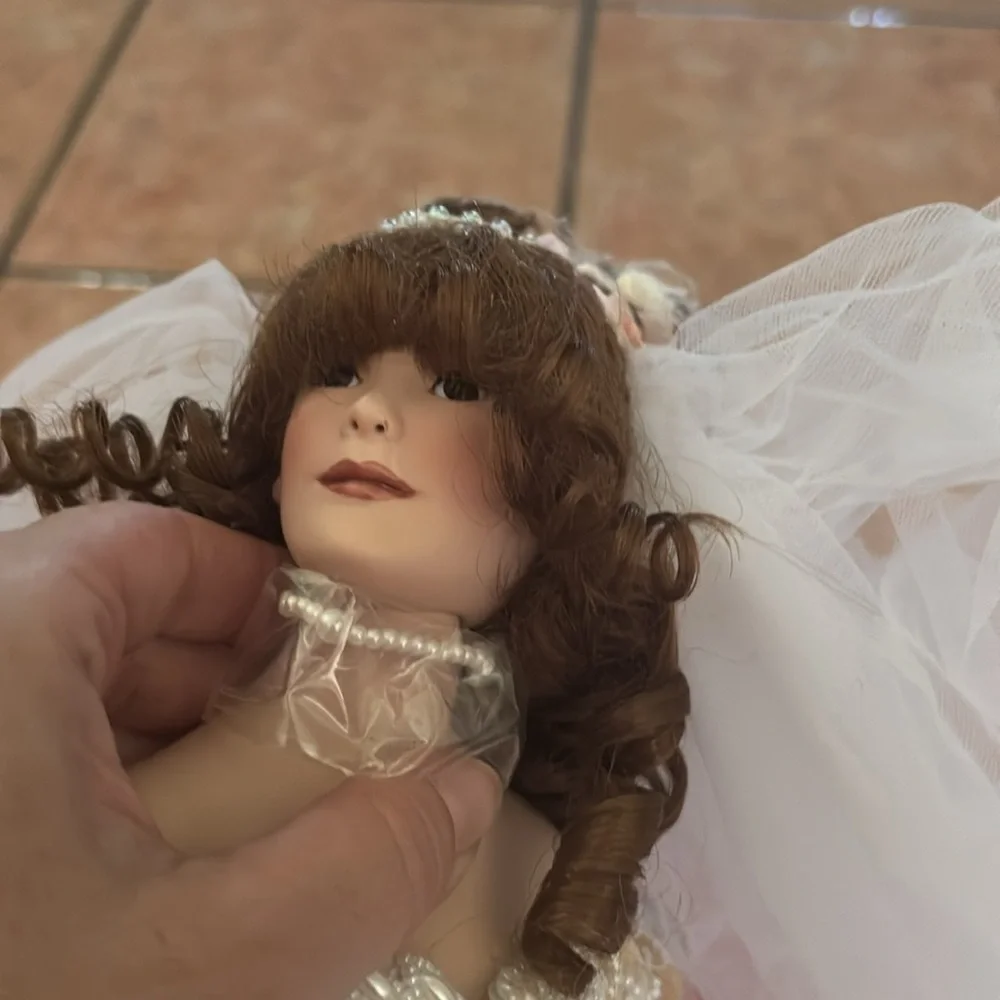 Elegant Cream Porcelain Bride Doll - Picture 4 of 8